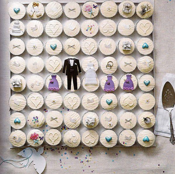 Wedding - Cute ivory wedding cupcakes with bride and groom