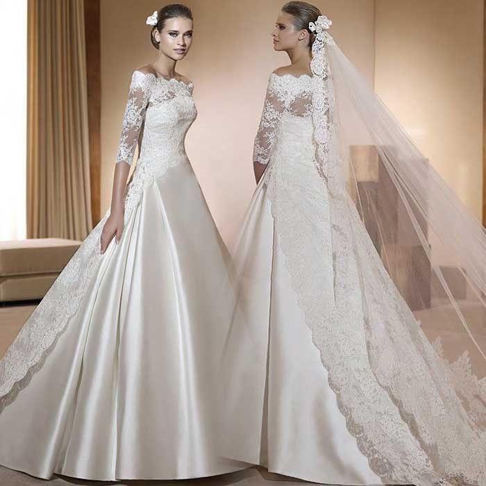 Wedding - An off-shoulder wedding gown with the floor-length veil.