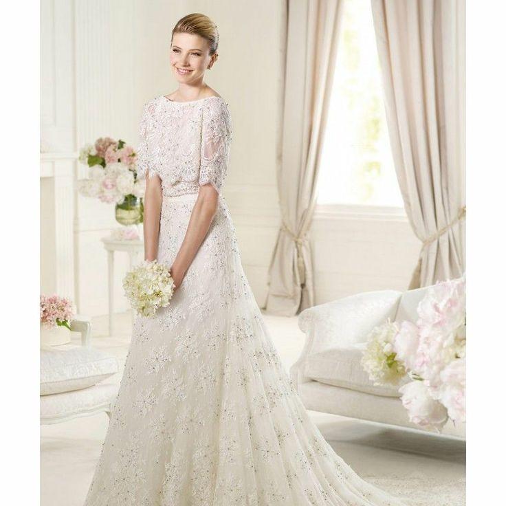 Wedding - An elegant white-colored wedding dress with the glamorous bun.
