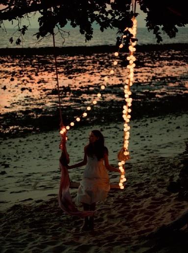 Wedding - light swing by the sea side