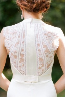 wedding photo - Sophisticated white wedding dress with laced back