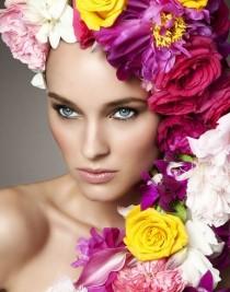 wedding photo - Makeup with wonderful hairstyle made up of blossoms.