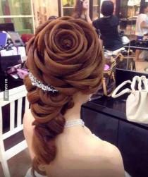 wedding photo - Wedding hairstyle looks like a rose with petals.